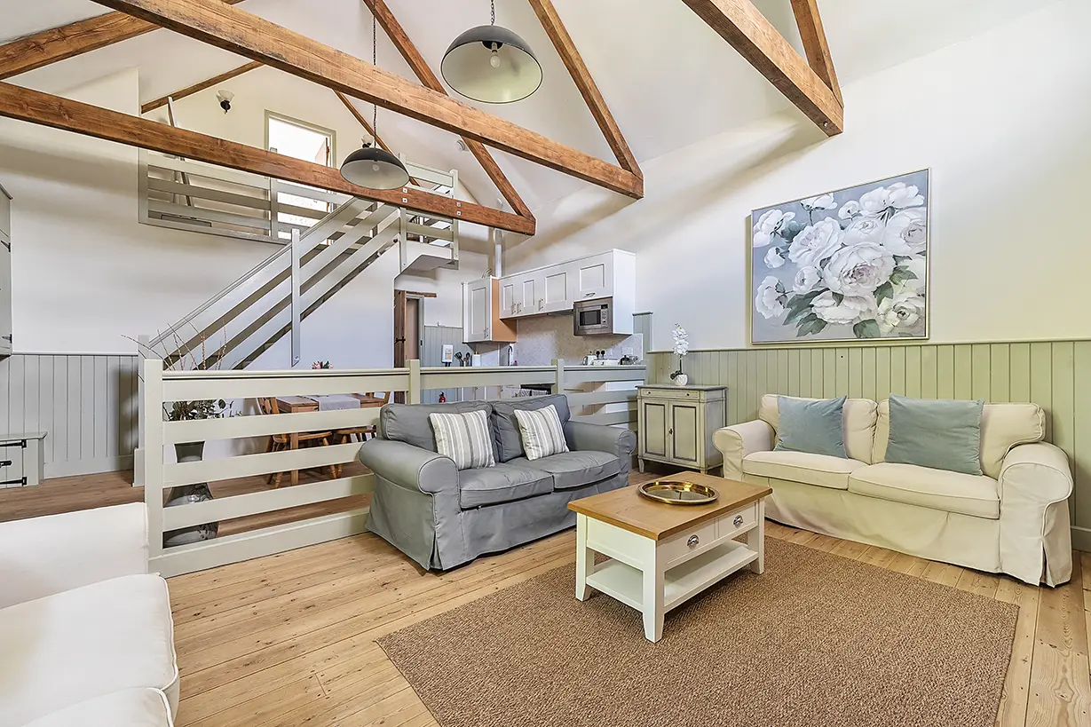 The Cider Barn open-plan living space with vaulted ceiling